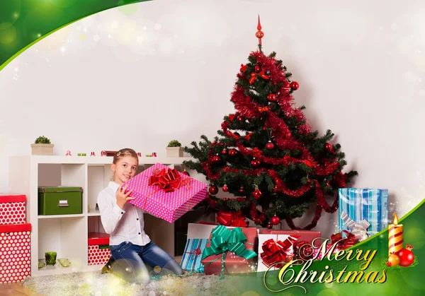 Kids with their christmas presents — Stock Photo, Image