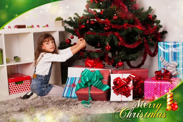 Kids with their christmas presents — Stock Photo, Image