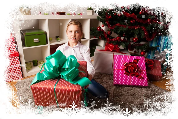 Kids with their christmas presents — Stock Photo, Image