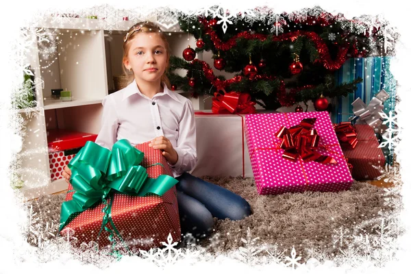 Kids with their christmas presents — Stock Photo, Image