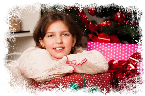 Niños con sus regalos de Navidad — Foto de Stock