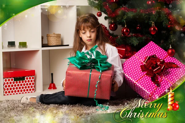 Kids with their christmas presents — Stock Photo, Image