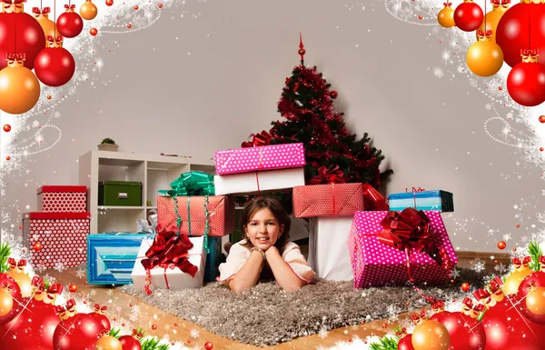 Kids with their christmas presents — Stock Photo, Image