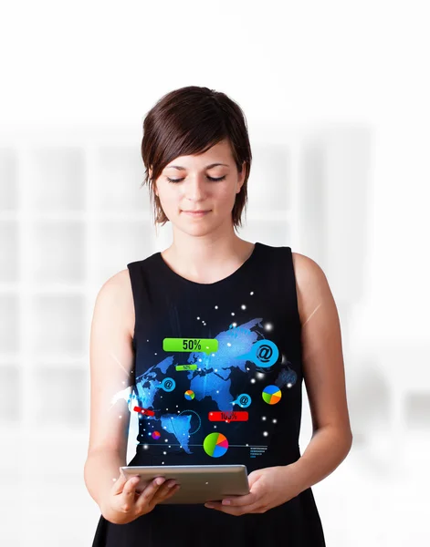 Young woman looking at modern tablet with colourful technology i — Stock Photo, Image