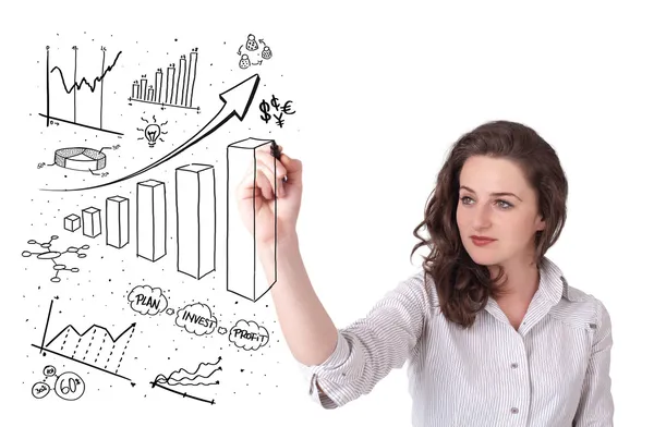 Junge Geschäftsfrau zeichnet Diagramme auf Whiteboard — Stockfoto