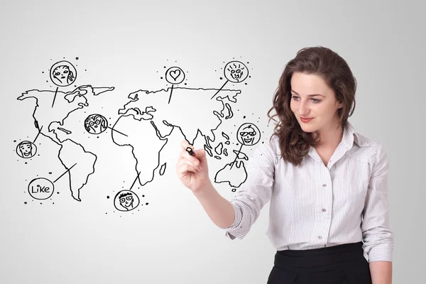 Young woman drawing a social map on whiteboard — Stock Photo, Image