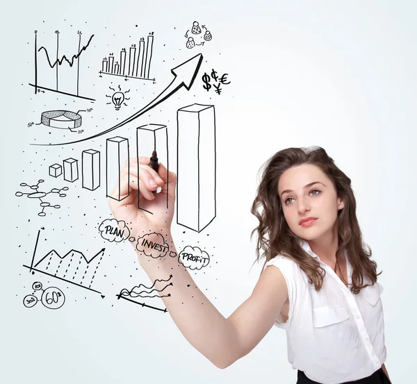 Young business woman drawing diagrams on whiteboard — Stock Photo, Image