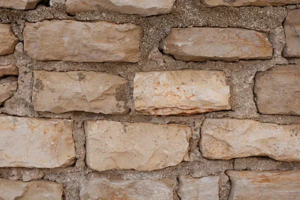 Textura de un muro de piedra — Foto de Stock