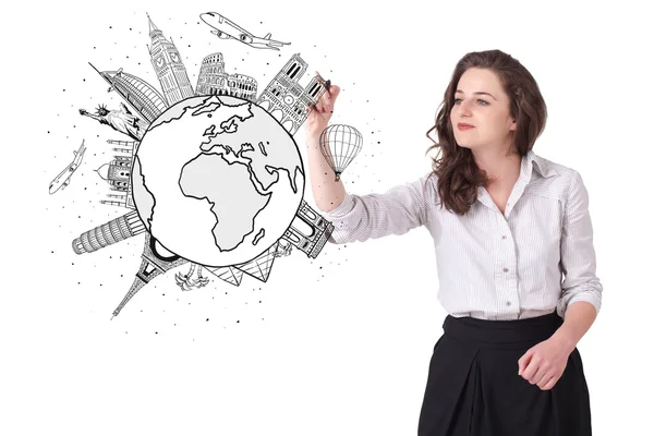 Young woman drawing a globe on whiteboard — Stock Photo, Image