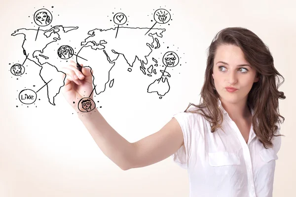 Young woman drawing a social map on whiteboard — Stock Photo, Image