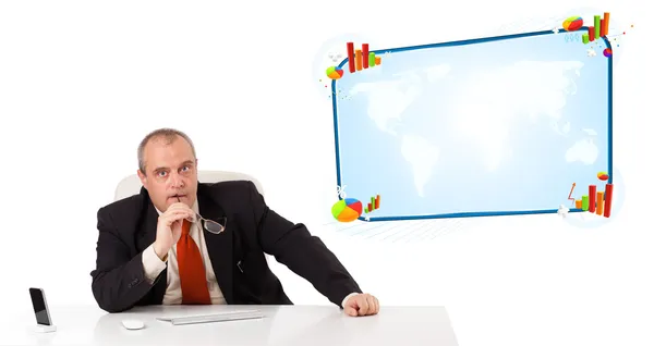 Businessman sitting at desk with copy space — Stock Photo, Image