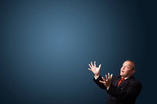 Funny businessman gesturing with copy space Stock Photo