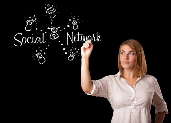 Woman draving social network theme on whiteboard Royalty Free Stock Photos