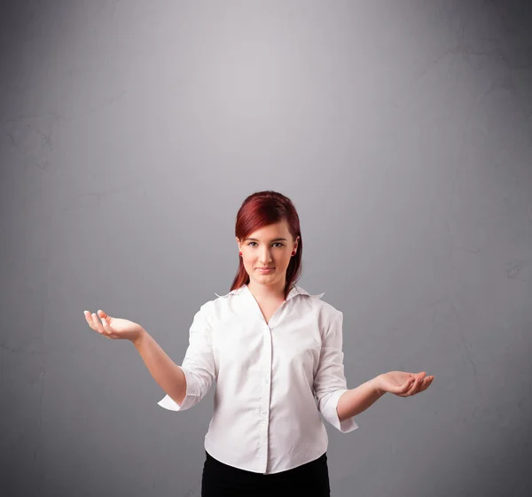 Beautiful young lady juggling with copy space — Stock Photo, Image