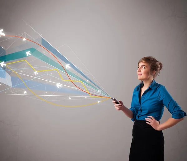 Menina bonita segurando um telefone com linhas abstratas coloridas um — Fotografia de Stock