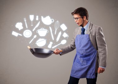 mutfak aksesuarları simgeleri ile yakışıklı adam