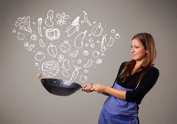 Vrouw koken groenten — Stockfoto