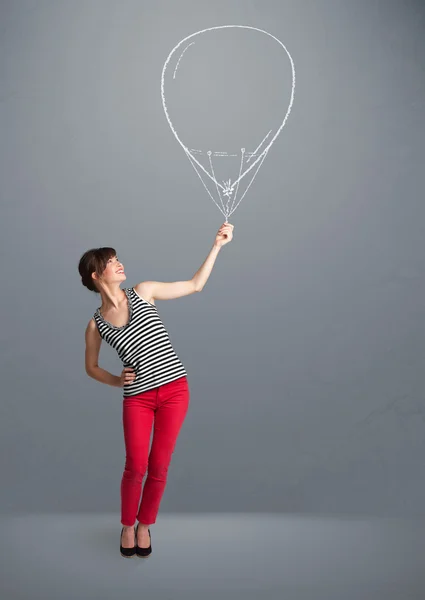 Schöne Frau mit Luftballon-Zeichnung — Stockfoto