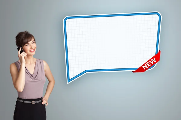 Young woman standing next to a modern speech bubble copy space a — Stock Photo, Image