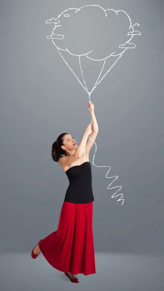 Pretty lady holding a cloud balloon drawing — Stock Photo, Image