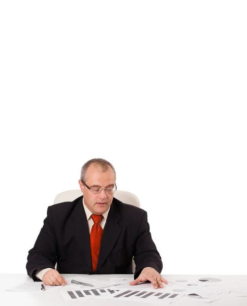 Businessman sitting at desk with copy space — Stock Photo, Image