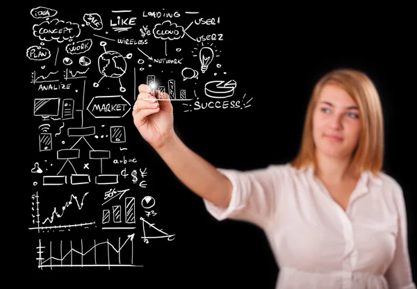 Woman drawing business scheme and icons on whiteboard — Stock Photo, Image