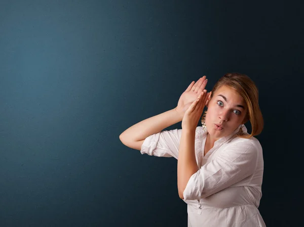 Young woman making gestures — Stock Photo, Image