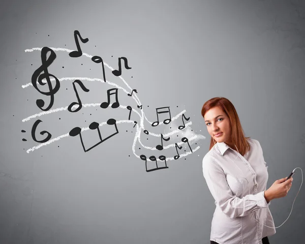 Attractive young lady singing and listening to music with musica — Stock Photo, Image