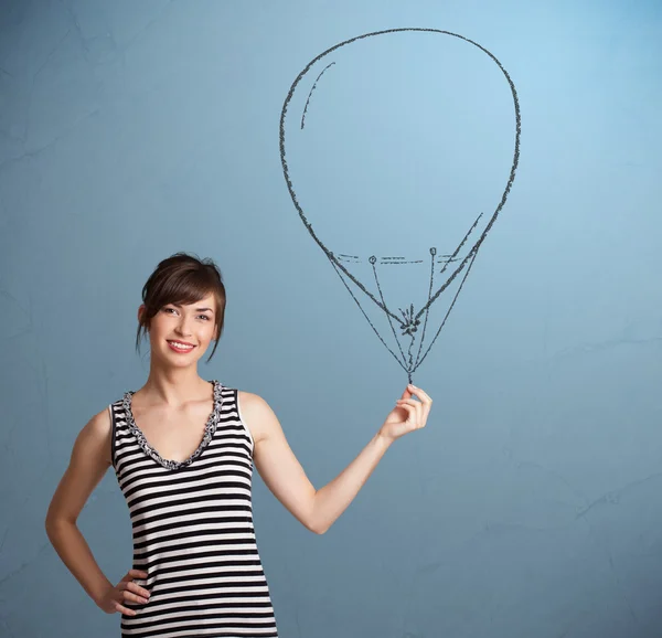 Vacker kvinna som håller ballong ritning — Stockfoto