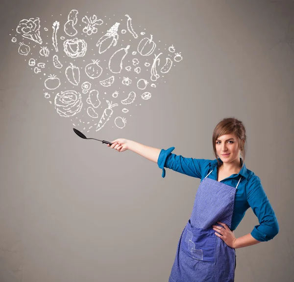 Vrouw koken groenten — Stockfoto