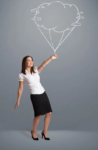 Pretty lady holding a cloud balloon drawing — Stock Photo, Image