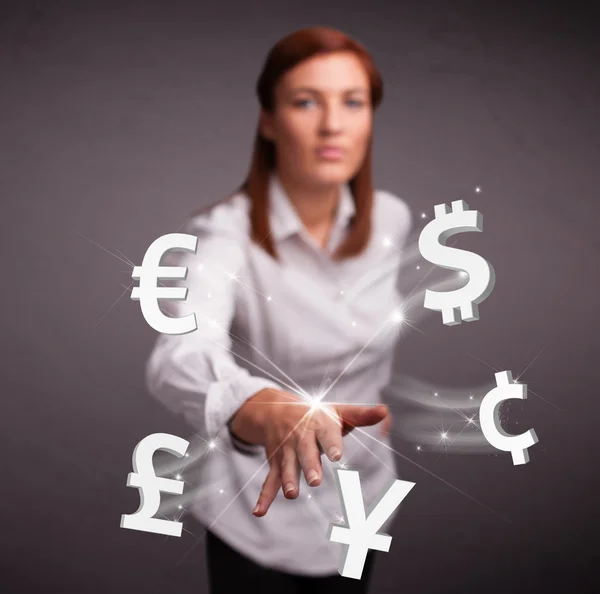 Young lady throwing currency icons — Stock Photo, Image