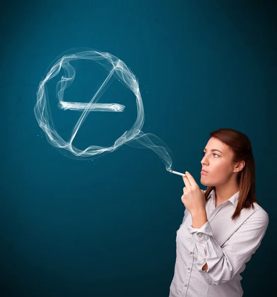 Young lady smoking unhealthy cigarette with no smoking sign — Stock Photo, Image