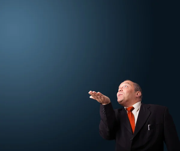 Funny businessman gesturing with copy space Stock Picture