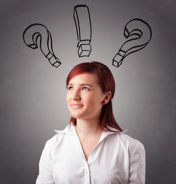 Young lady thinking with question marks overhead — Stock Photo, Image