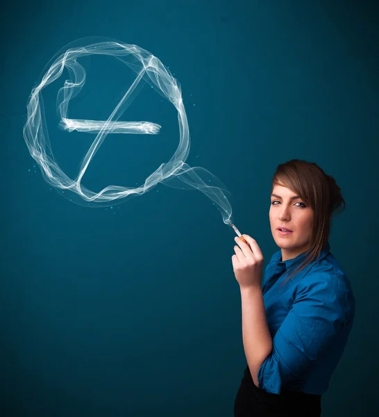 Young lady smoking unhealthy cigarette with no smoking sign — Stock Photo, Image