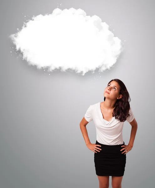 Mujer atractiva buscando espacio de copia en la nube abstracta — Foto de Stock