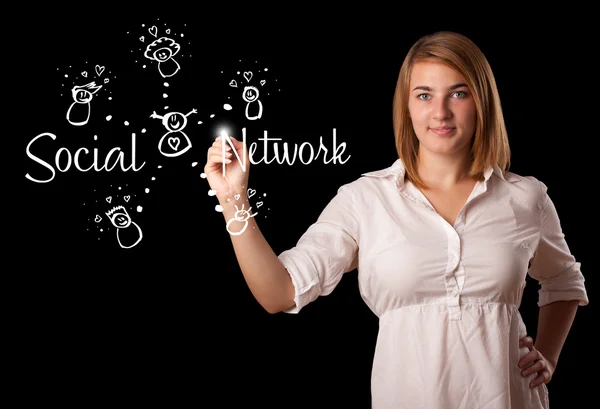 Woman draving social network theme on whiteboard Stock Picture