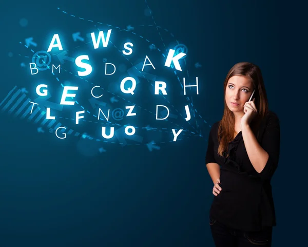 Young lady making phone call with shiny characters — Stock Photo, Image