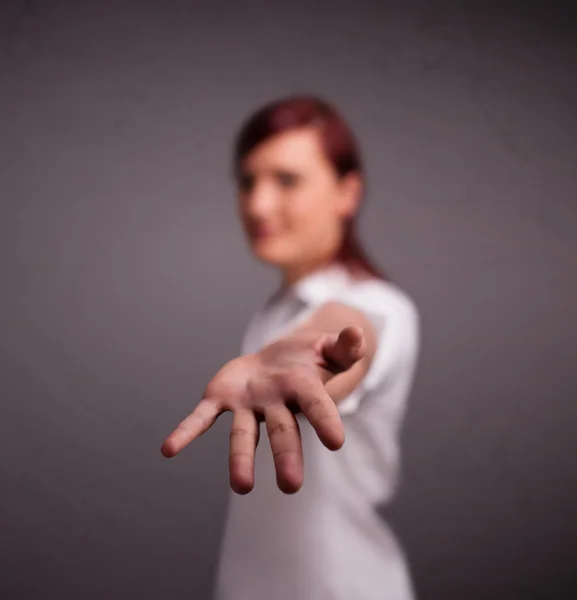 Menina bonita segurando algo — Fotografia de Stock