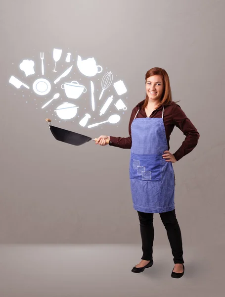 Jonge vrouw met keuken accessoires iconen — Stockfoto