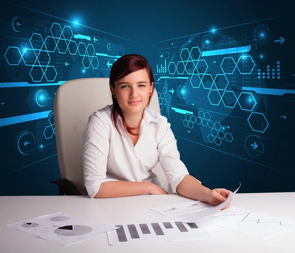 Zakenvrouw doet papierwerk met futuristische achtergrond — Stockfoto