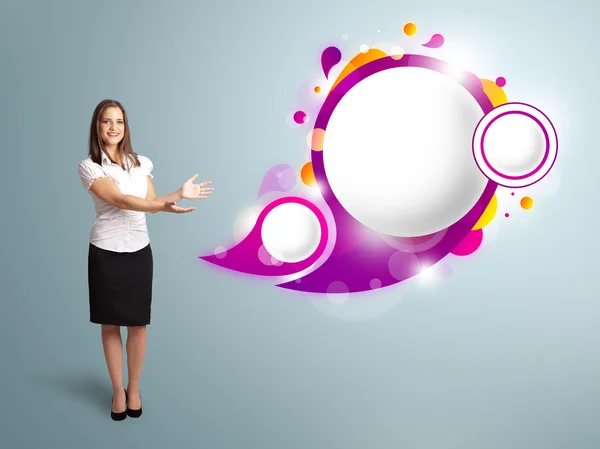 Attractive woman presenting abstract speech bubble copy space — Stock Photo, Image