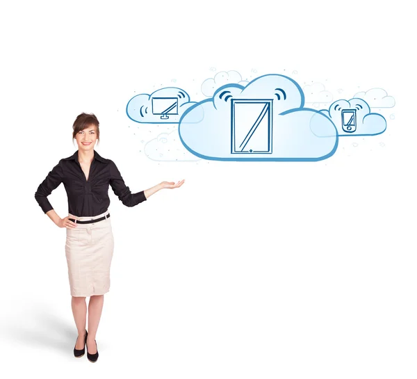Young woman presenting modern devices in clouds — Stock Photo, Image