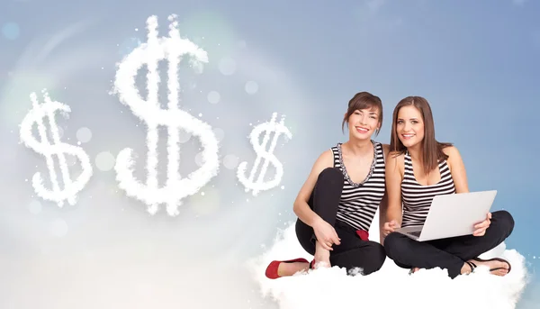 Young women sitting on cloud next to cloud dollar signs — Stock Photo, Image