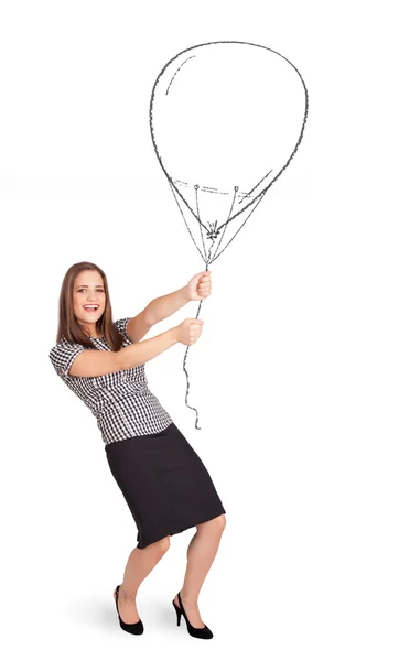 Hezká žena drží balónek kresba — Stock fotografie
