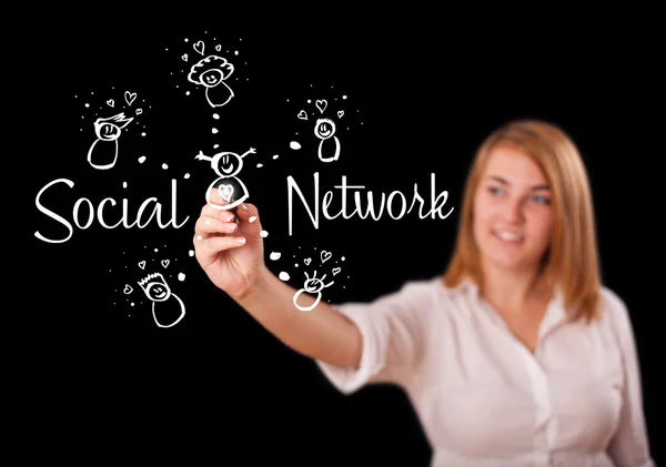 Woman draving social network theme on whiteboard Royalty Free Stock Images