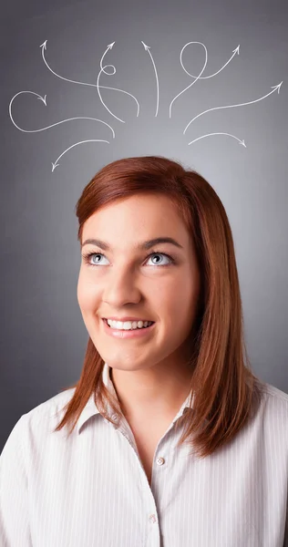 Young girl thinking with arrows overhead — Stock Photo, Image