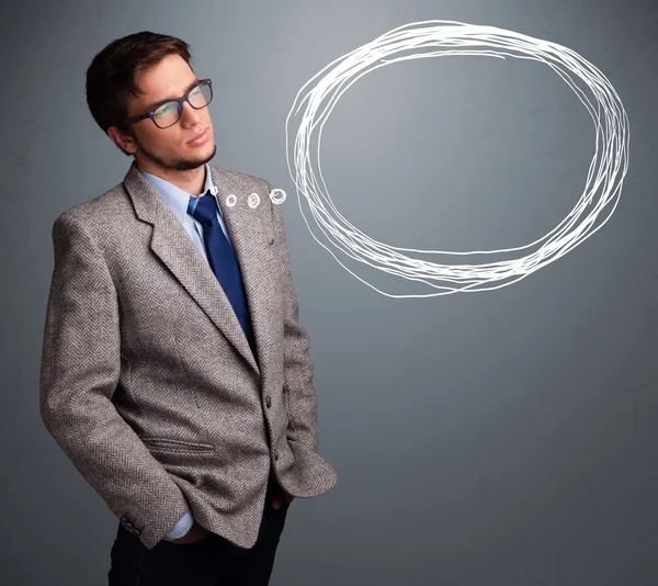 Good-looking man thinking about speech or thought bubble with co — Stock Photo, Image