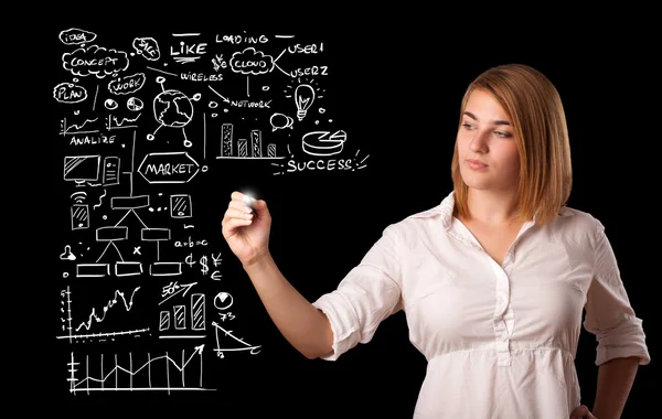 Woman drawing business scheme and icons on whiteboard — Stock Photo, Image